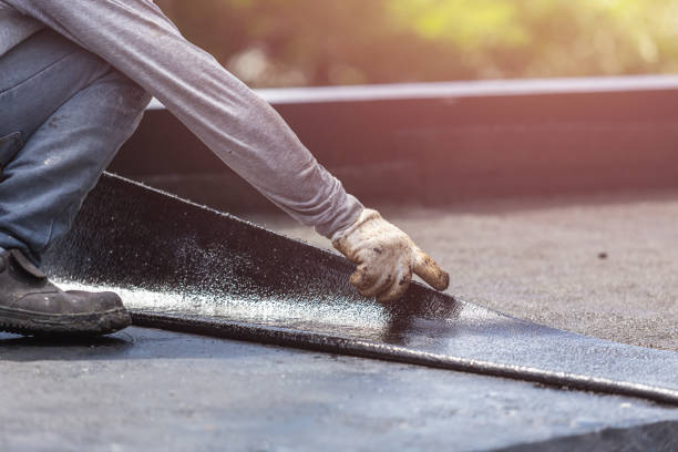 Professional Basement Waterproofing technician working in Leo, IN